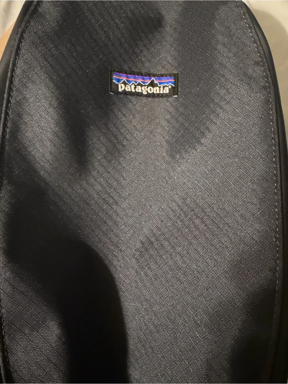 Patagonia Black Toiletry Bag with Blue Logo and Red Trim